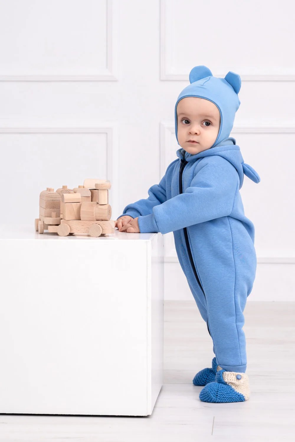 Rankų darbo žydros spalvos romperiukas Rankų darbo žydros spalvos romperiukas