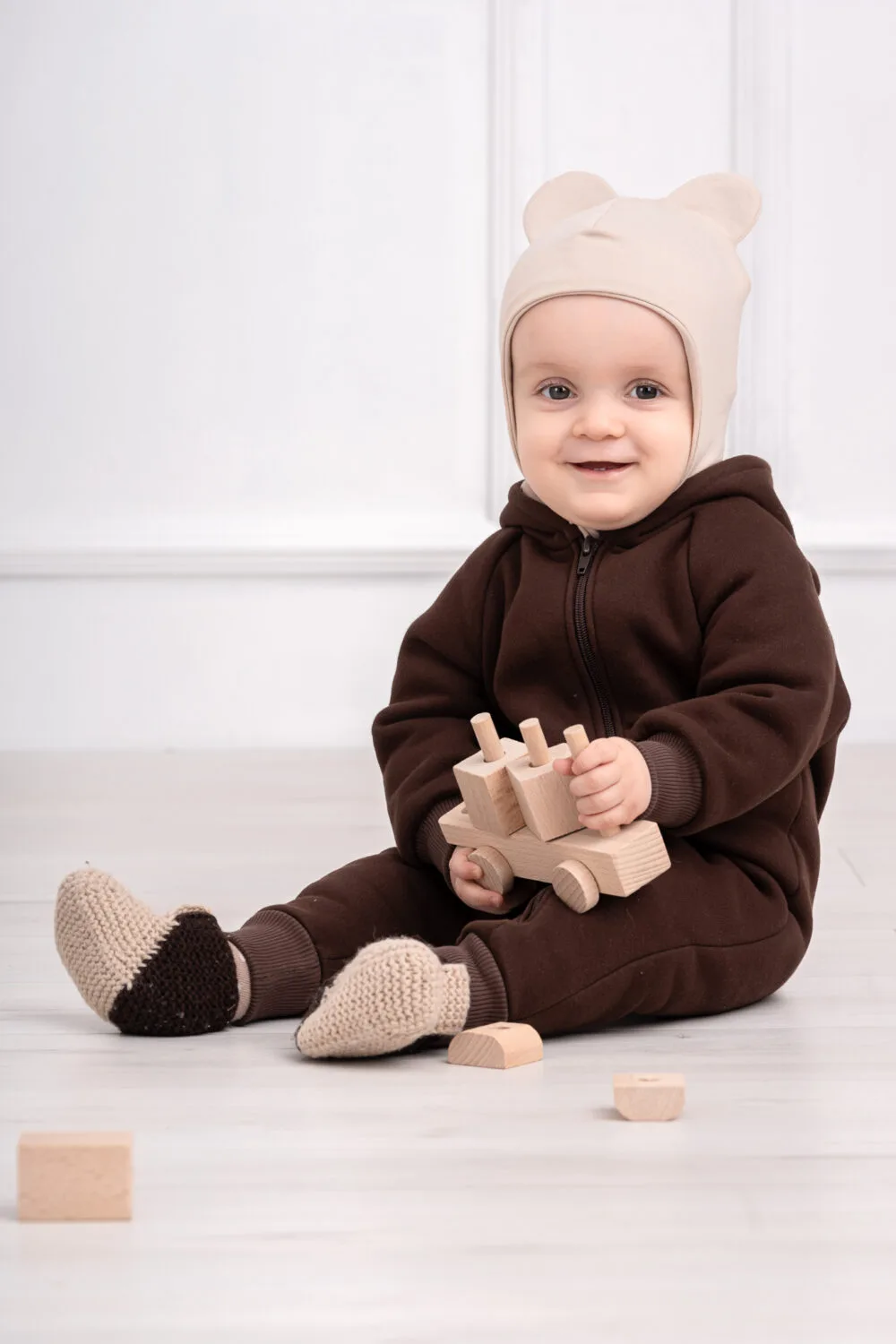 šokoladinės spalvos romperiukas